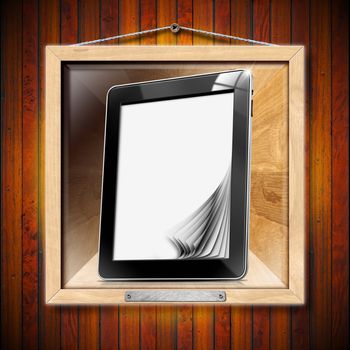 Black tablet computer with blank pages on wooden frame

