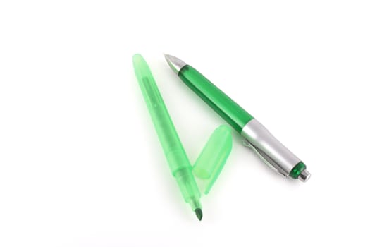 Green pen and felt-tip pen over white