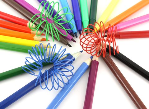 Color pencils, felt-tip pens and spirals over white