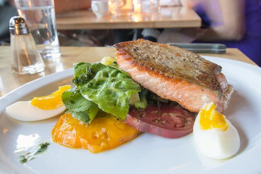 Pan Seared Salmon with Heirloom Tomatoes Green Vegetables and Hard Boiled Eggs