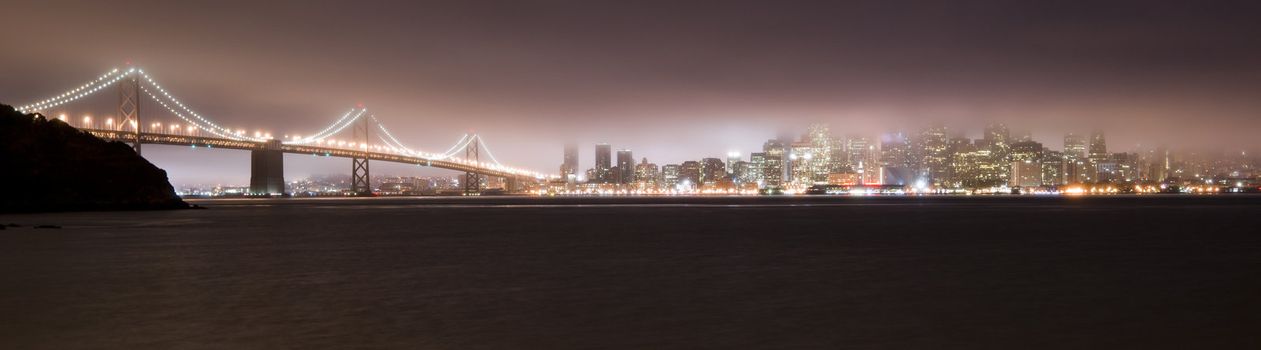 Bay Bridge and San Francisco in the Fog at night