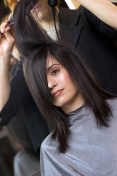 A haircut and blow dry at the salon