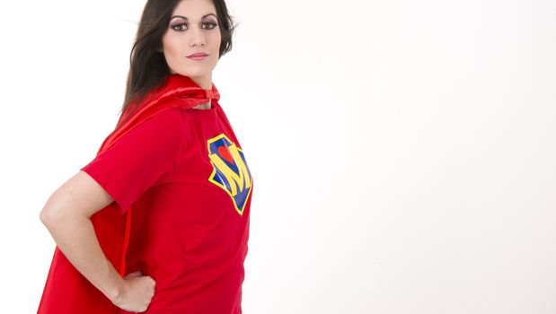Woman wears a superhero style t-shirt and cape
