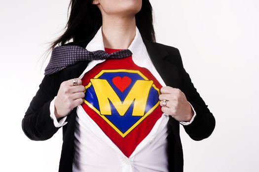 Woman wears a superhero style t-shirt under her business suit
