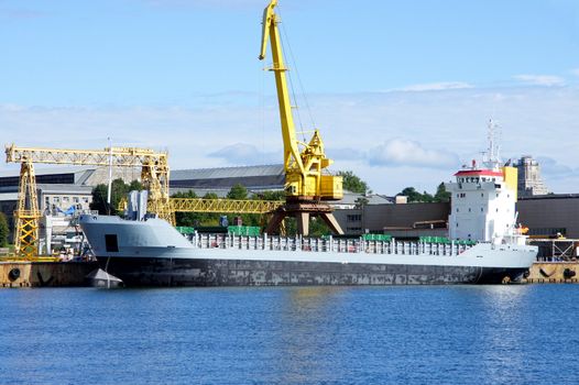 The cargo ship costs at a mooring