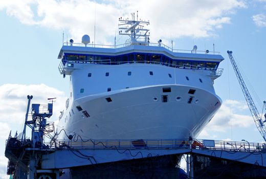 The big white vessel costs in dock