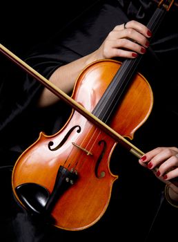 A beautiful pair of hands holds a great Violin