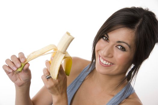 Beautiful Brunette holds a Banana