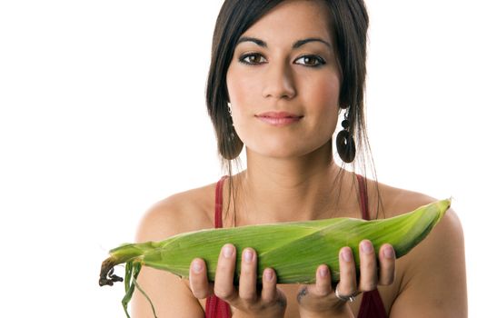 Beautiful Brunette holds a corn stalk