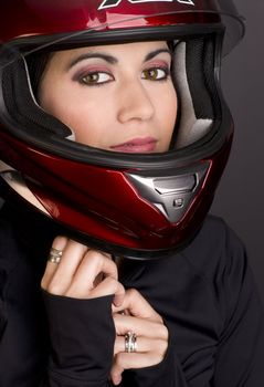 Full Face Helmet protects a beautiful brunette woman