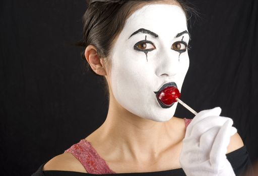 A female Mime enjoys a sucker