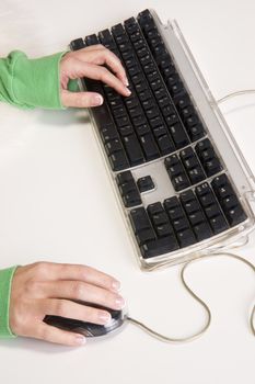 A woman's hands Beautifully manicured on a keyboard