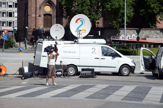 Film crew from TV 2 Norway prepares consignments from memorial ceremony to be held for the victims of the bomb in Oslo and the massacre at Utöya