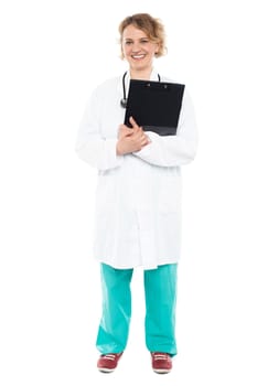 Full length shot of an aged female doctor posing with stethoscope around her neck