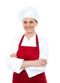 Portrait of smiling middle aged cook in uniform isolated against white background