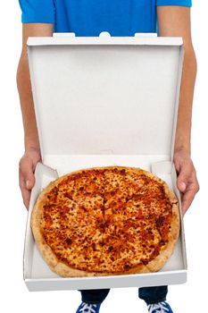 A person showing an open pizza box isolated over white back ground.