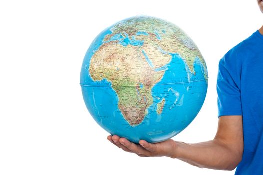 Cropped image of man holding globe over white background