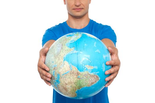 Closeup shot of man holding globe isolated over white