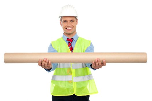 Successful male architect presenting blueprints to you