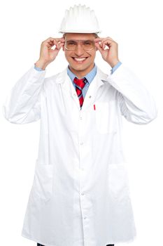 Smiling architect holding eyeglasses isolated on white background