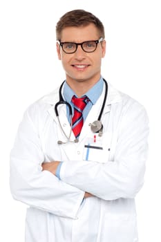 Attractive portrait of confident male doctor posing with arms crossed