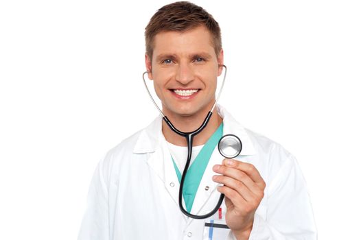 Its time for a regular checkup. Smiling male physician with stethoscope