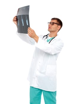 Portrait of male surgeon holding x-ray report isolated over white background