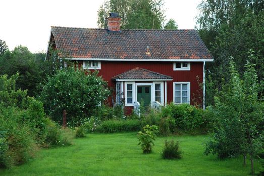 Traditional red cottage in sweden.
