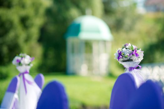 Wedding chairs and flowers in the garden 