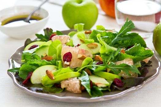 Apple,Grapefruit with cranberry and almond salad by Balsamic dressing