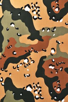 Closeup camouflage fabric in a vertical orientation