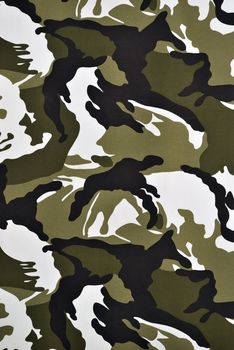 green camouflage fabric in a vertical orientation