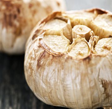 Close up of fresh roasted garlic bulbs