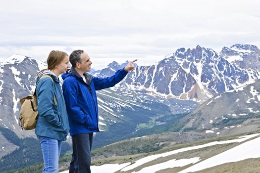 Father and daughter enjoying scenic Canadian Rocky Mountains view in Jasper National park
