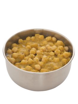 close up of a bowl of chickpea curry isolated