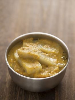 close up of a bowl of eggplant curry