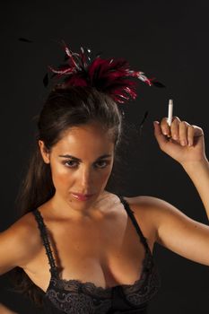 Smoking woman with a  retro cabaret dancer outfit