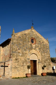 CHIESA di SANTA MARIA in Piazza Roma the main square. Monteriggioni Tuscany Italy