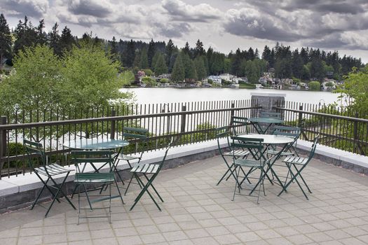 Garden Outdoor Patio Seating by the Lake with View of Waterfront Homes