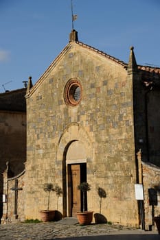 CHIESA di SANTA MARIA in Piazza Roma the main square. Monteriggioni Tuscany Italy