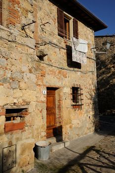 Typica house in tuscan medieval village of Monteriggioni