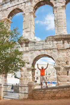  Tourist near the Roman amphitheater in Pula, Croatia