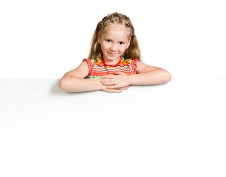 cute little girl behind a white banner