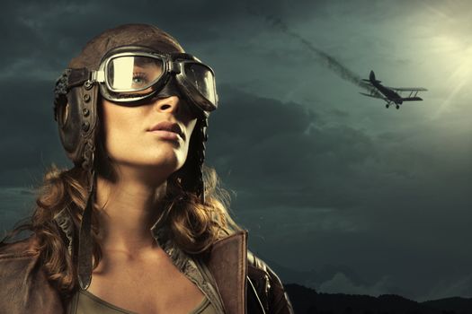 Portrait of young woman airplane pilot