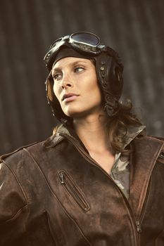 Portrait of young woman aviator