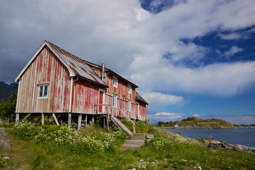 Old deteroriated fishing house on Lofoten islands in Norway