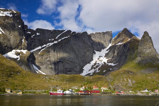 Picturesque fishing harbor by  fjord on Lofoten islands in Norway