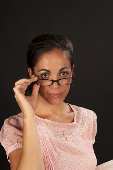 Hispanic woman giving the camera a stern look