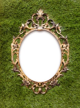 Classic round empty frame on green grass
