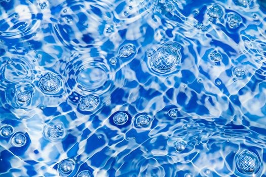 Rippling blue water surface, nature background